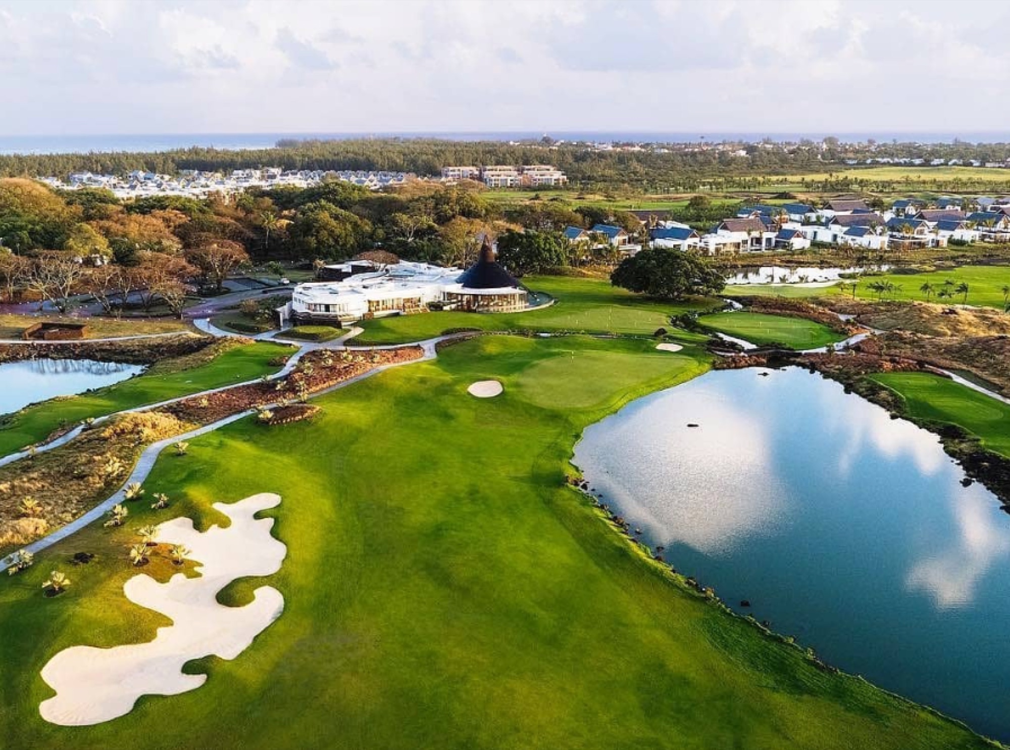 Championship golf course framed by casuarina trees at Mont Choisy